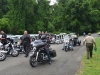 riders-going-passed-line-of-cop-motorcycles-min
